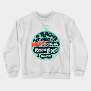 A teacher activates the magnets of curiosity, knowledge and wisdom Crewneck Sweatshirt